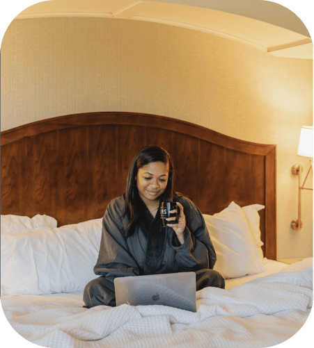 A guest relaxing in a suite at The Elms